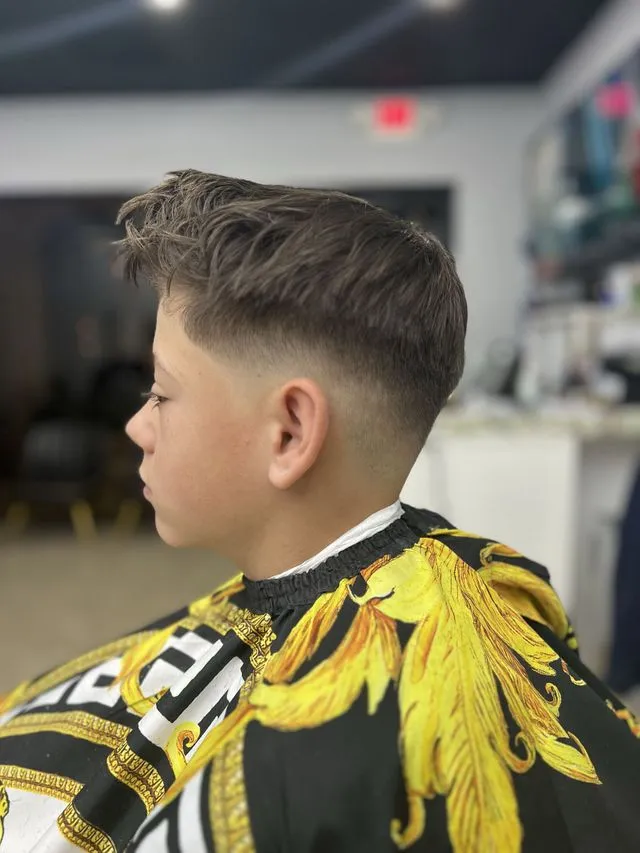 Kids haircut styled with precision at Who's Next Boca Raton